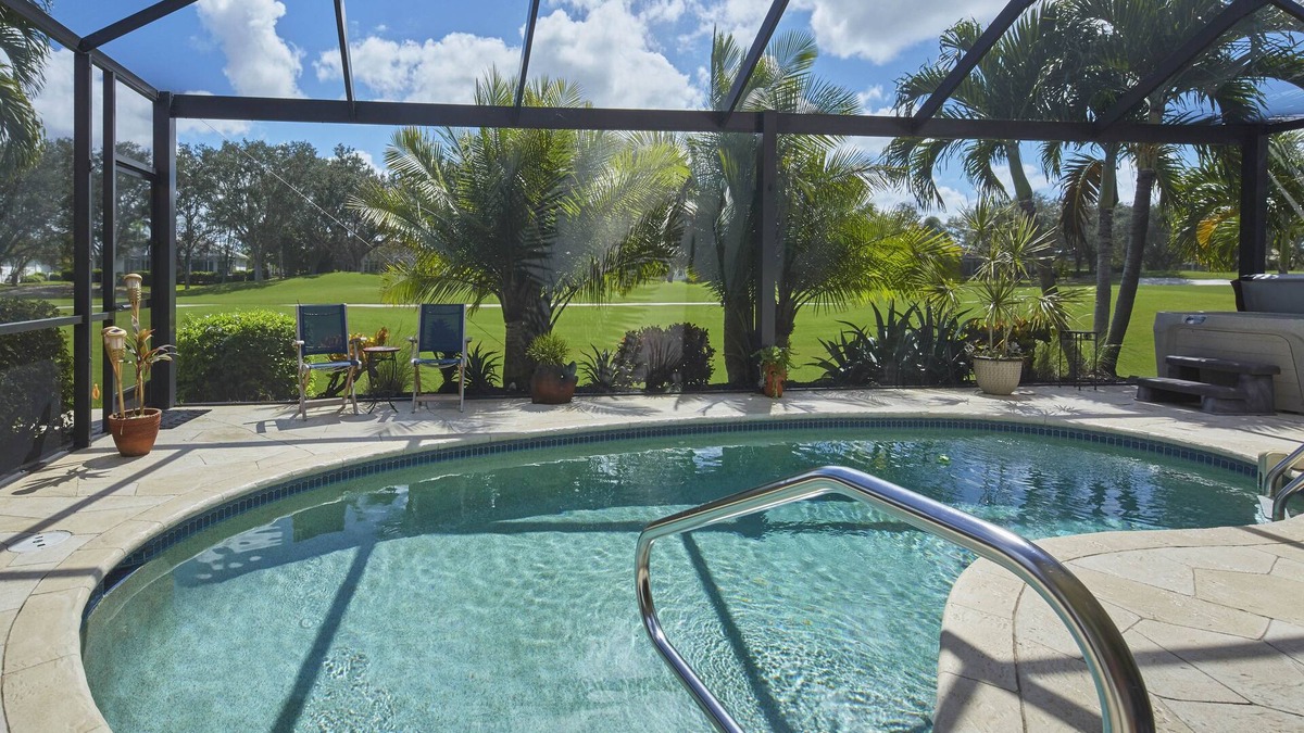 Falcons Glen House | Villa on golf course with heated saltwater pool.n