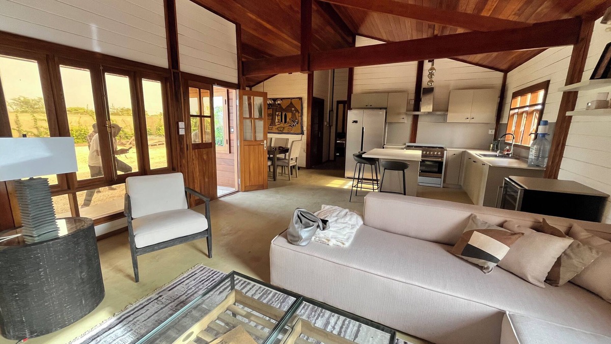Mbodiene Ski Chalet | Villa Siga Fall ~ Elegant Wooden 2BR Retreat Near la Petite Côte.