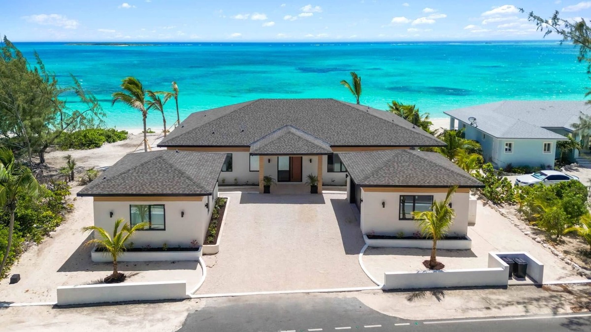 Tar Bay Villa | Villa Summerwinds, Beachfront on Flamingo Bay, Heated Pool + Carriage Home.