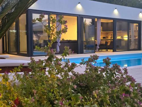 Milna (Brac) House | Villa TM with private heated pool, poolhouse & private garage