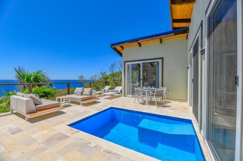 Lighthouse Estates Villa | Villa Topaz Above West Bay with 180 degree views!