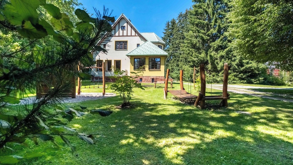 Mlade Buky Villa | Villa with an covered pool, park, and playground