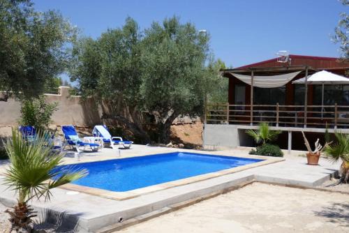 L'Ampolla Villa | Villa with private pool, L'Ampolla, garden and air conditioning.