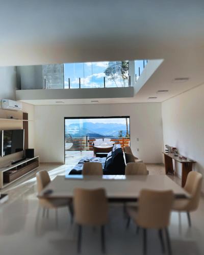 Marmelopolis House | Vita - Cabanas & Chalés Villaggio Girotto