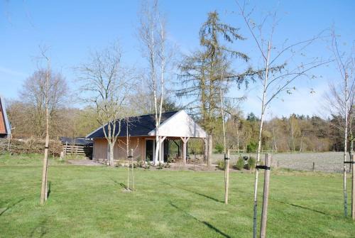 Bovensmilde Ski Chalet | Vrijstaande woning Drenthe bij het bos.