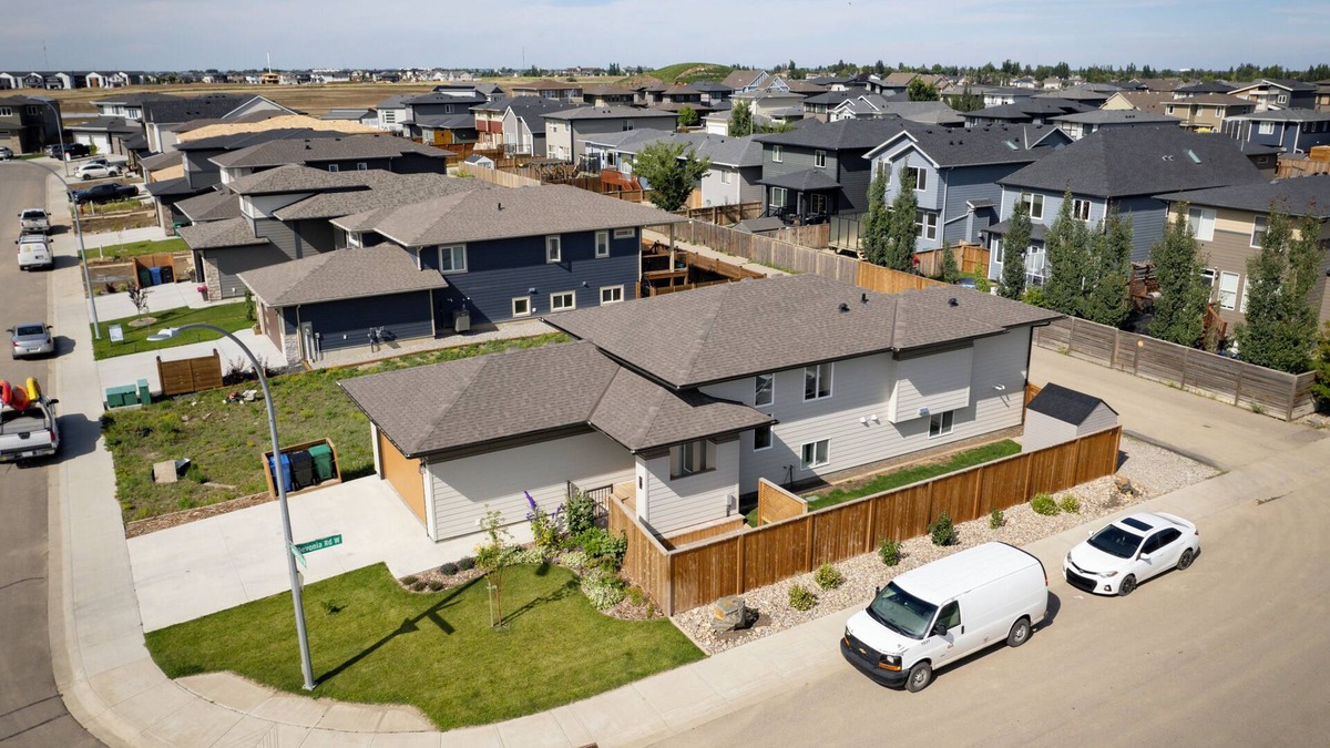 Lethbridge House | Walkout full separate 2BR 1Bath 3 queen beds suite. Separate entrance. Laundry.