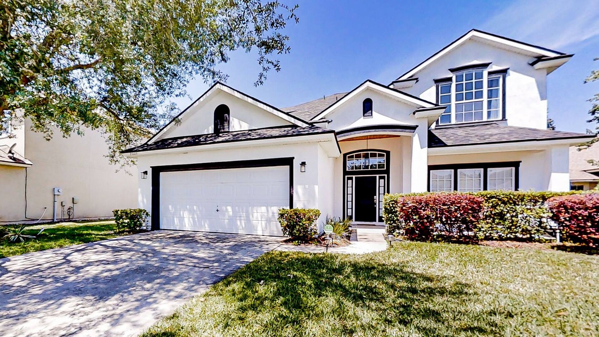 Westside House | Waterfront 2-story home with water views, patio, streaming, washer/dryer, & AC