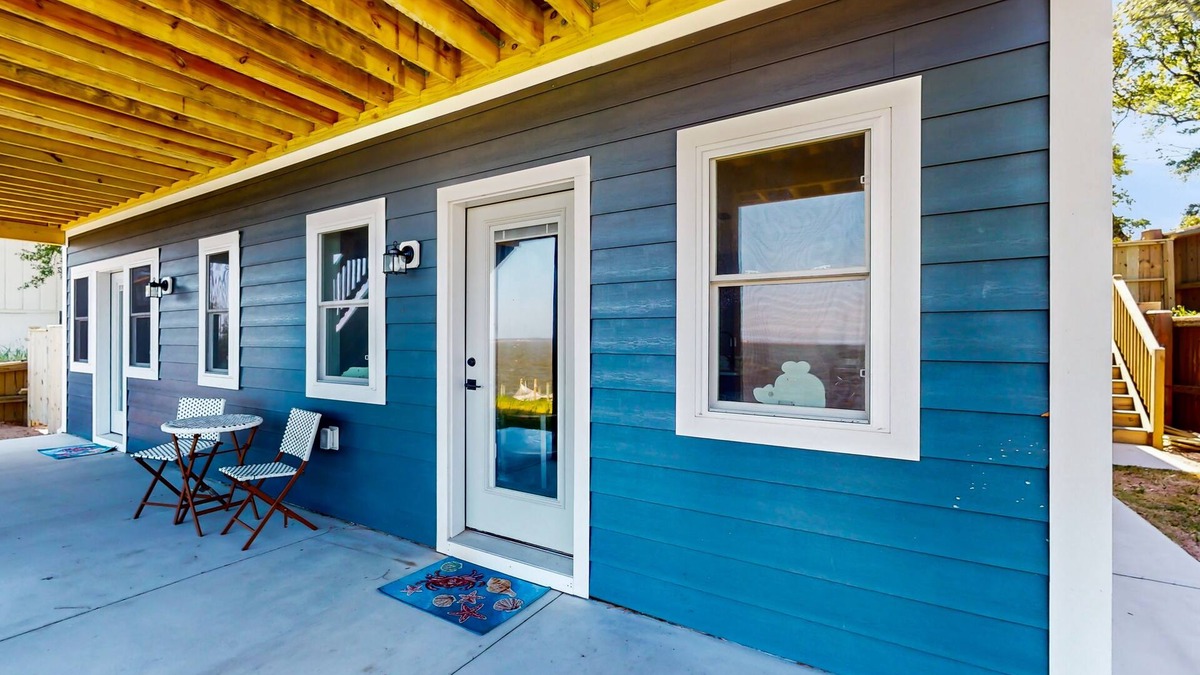 Colington Harbour Apartment | Waterfront apartment with lovely bay views, outdoor shower & fishing access