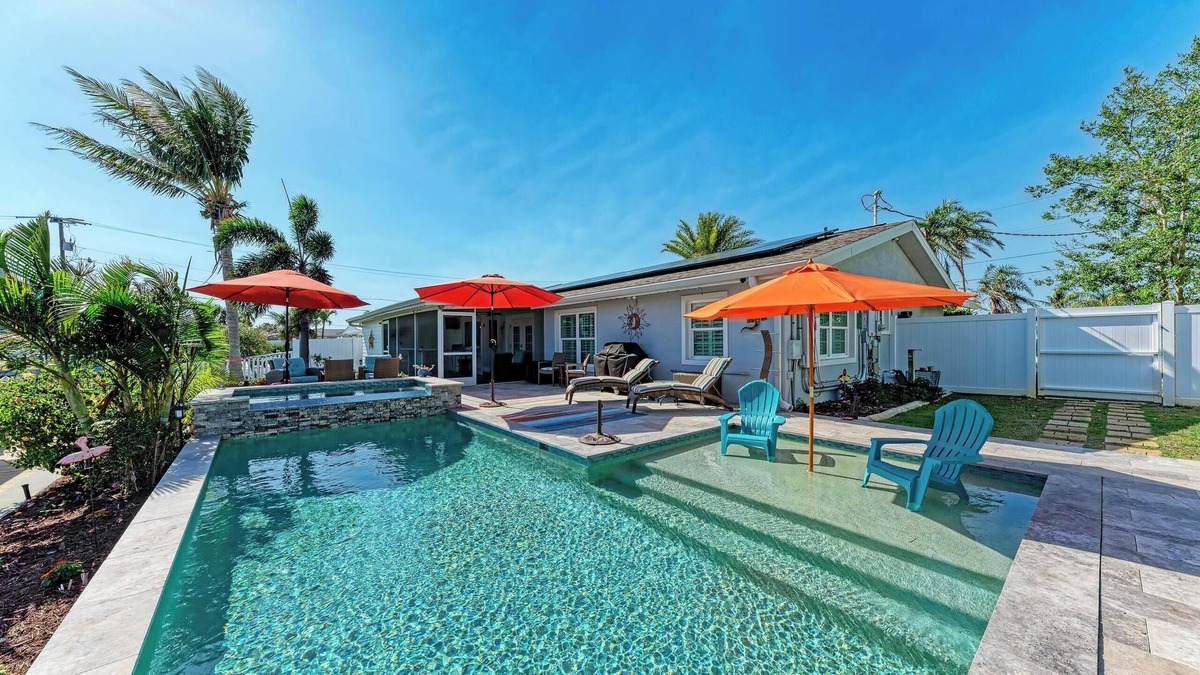 Whitney Beach House | Waterfront, Boat Dock, 5 Min to AMI, Heated Pool & Hottub