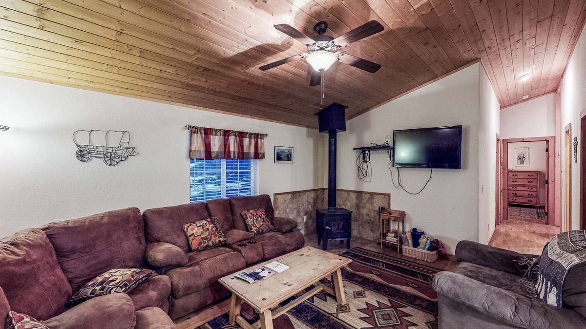 South Fork Cabin | Waterfront cabin with mountain view, wood stove, private hot tub, & WiFi