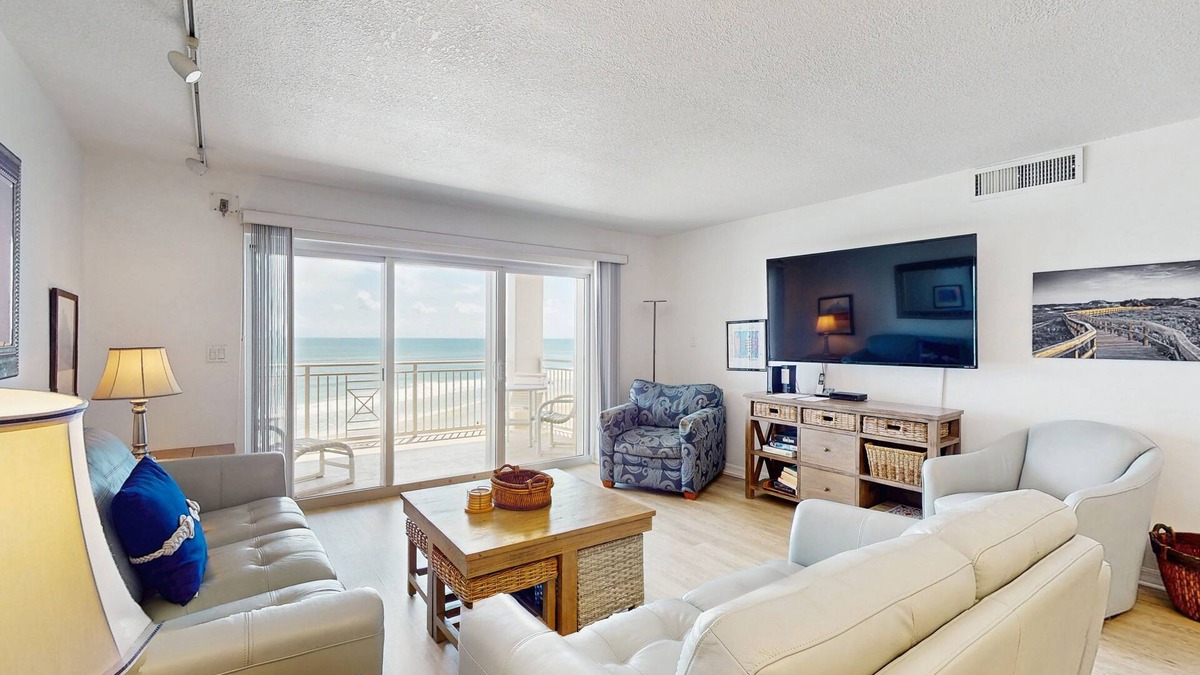 New Smyrna Beach Condo | Waterfront condo with pool,beach access, and resort amenities