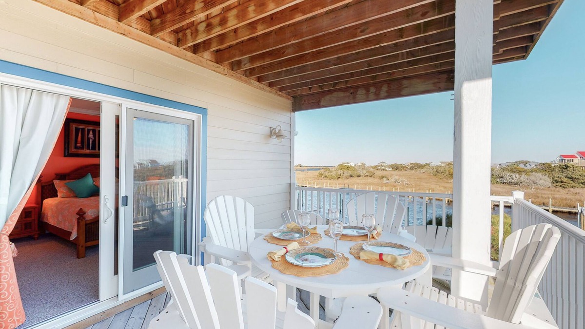 Hatteras Condo | Waterfront condo with pool, central AC, amazing views, & stylish decor