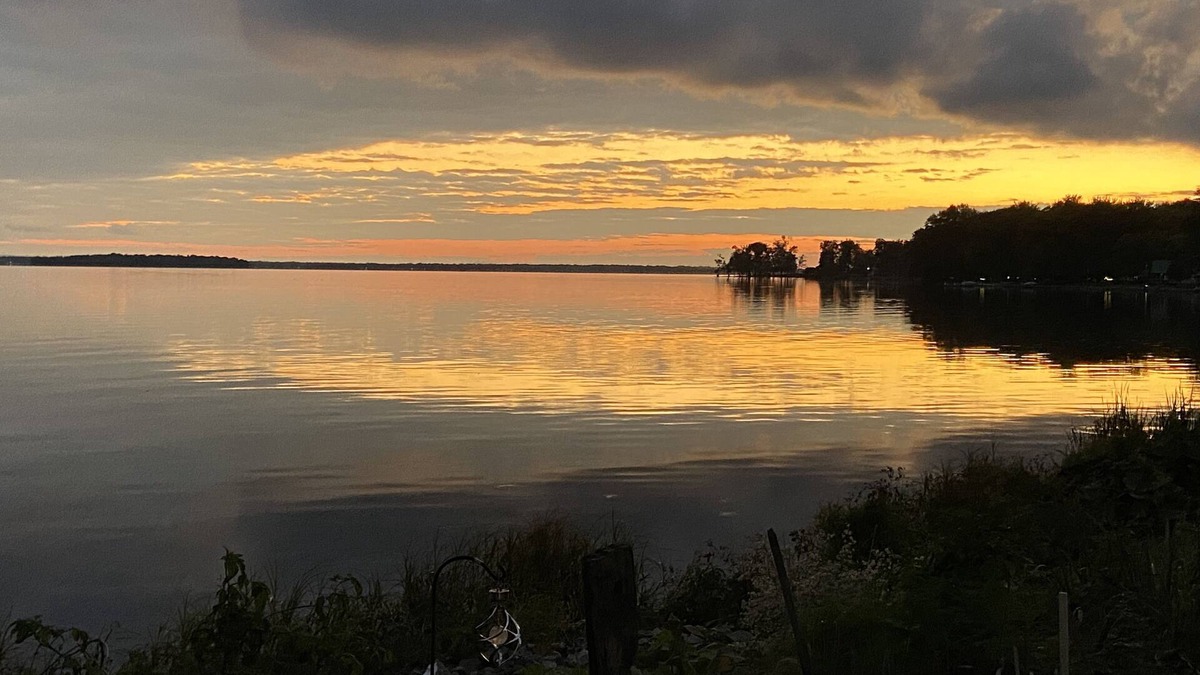 Constantia Cottage | WATERFRONT COTTAGE WITH WARM SUNSETS AND LARGE PORCH ON ONEIDA LAKE