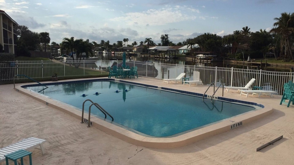 Cocoa Isles Condo | Waterfront! Enjoy Beautiful Sunsets and Fish off the Docks!
