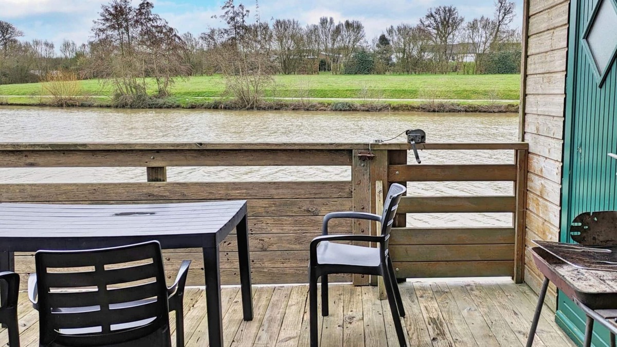 Villiers-Charlemagne Cottage | Waterfront Chalet with Private Fishing, Terrace, and Games, Sleeps 5-7