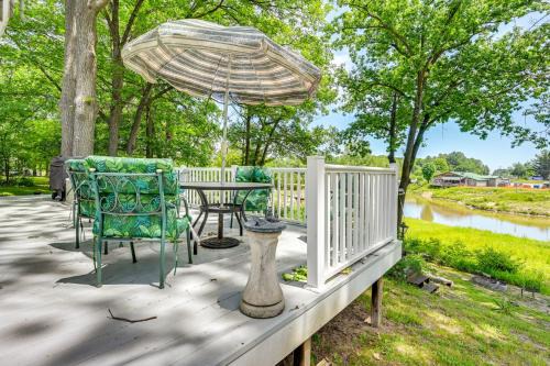 Gladwin House | Waterfront Gladwin Home with Deck and Fire Pit!