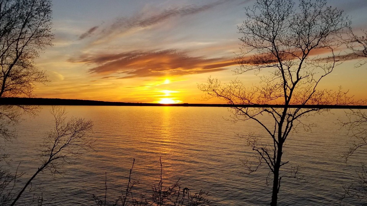 Herbster House | Waterfront guesthouse at cliff's edge of Lake Superior's South Shore, Sky Fire.
