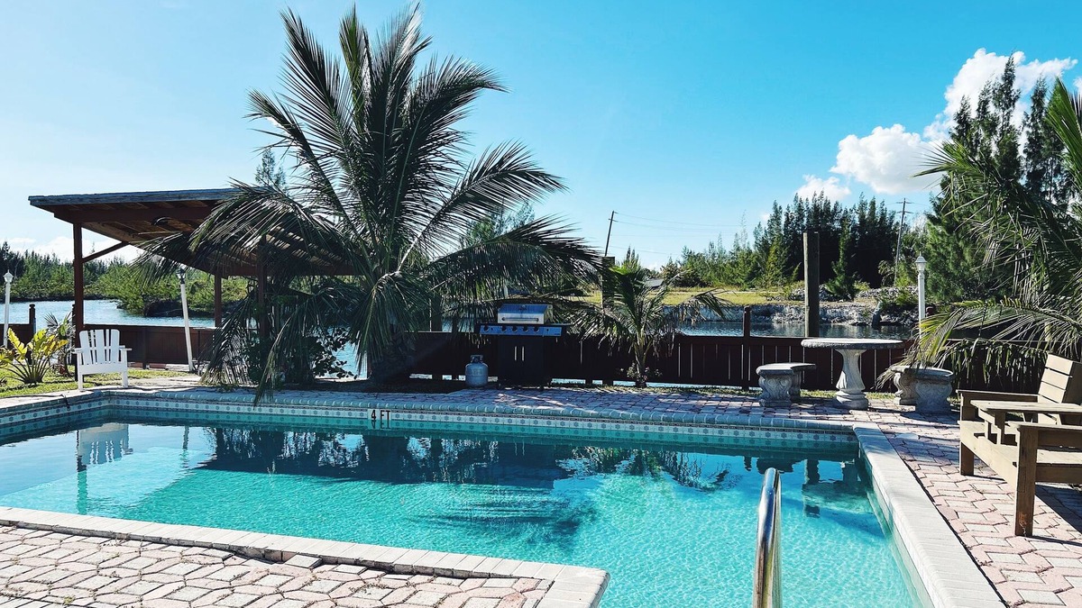 Williams Town House | Waterfront home with private dock near the beach