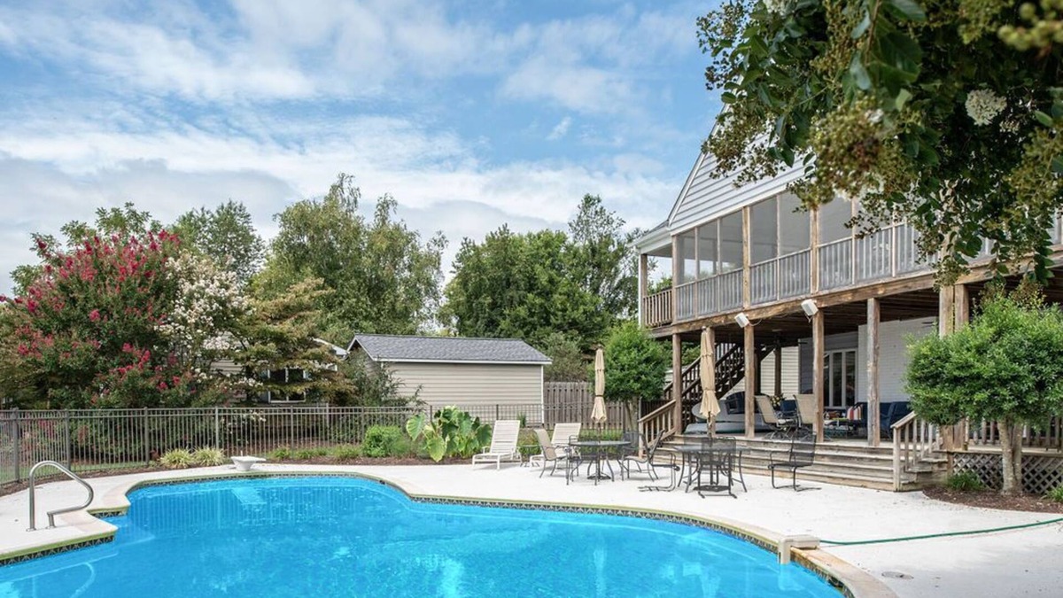 Dogue House | Waterfront home with swimming pool and tennis court.