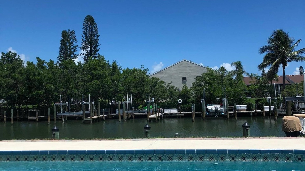 Fort Pierce Shores House | Waterfront Island Home with Dock, Pool and just steps to the Beach!