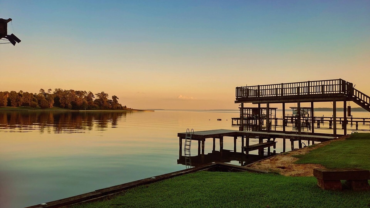 Pointblank House | Waterfront lake house, huge deck, king beds, family friendly on Lake Livingston!