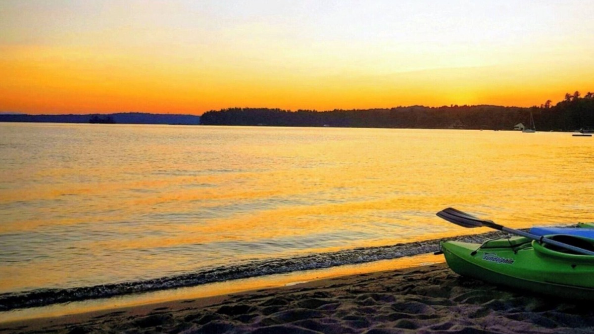 Melvin Village Cottage | Waterfront Lake Winnipesaukee cabins on private sandy beach with dock