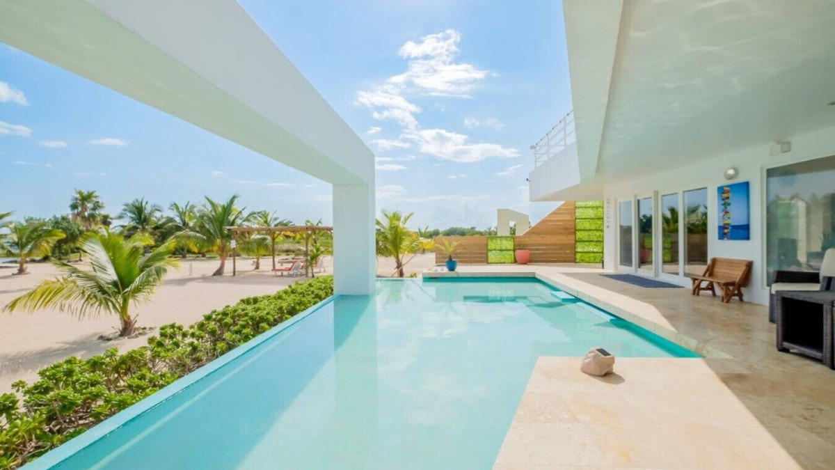 Gales Point Apartment | Waterfront Luxury Villa - 2 Private Pools, Own Boat & Captain, Free Shuttle