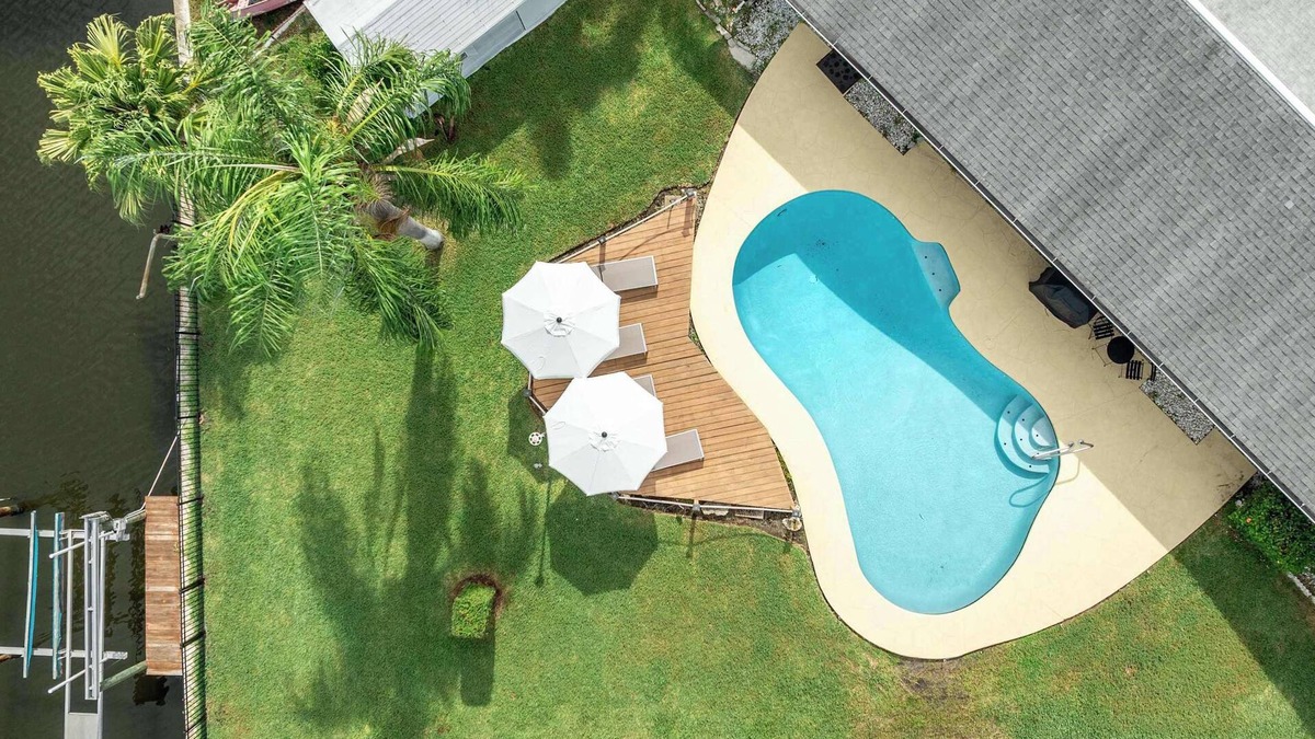 Bay Crest Park House | Waterfront Oasis Canal Views Boat Access Sleeps 10