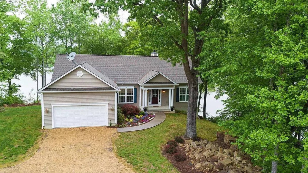 Orange House | Waterfront Oasis! Ready to Make a Splash?