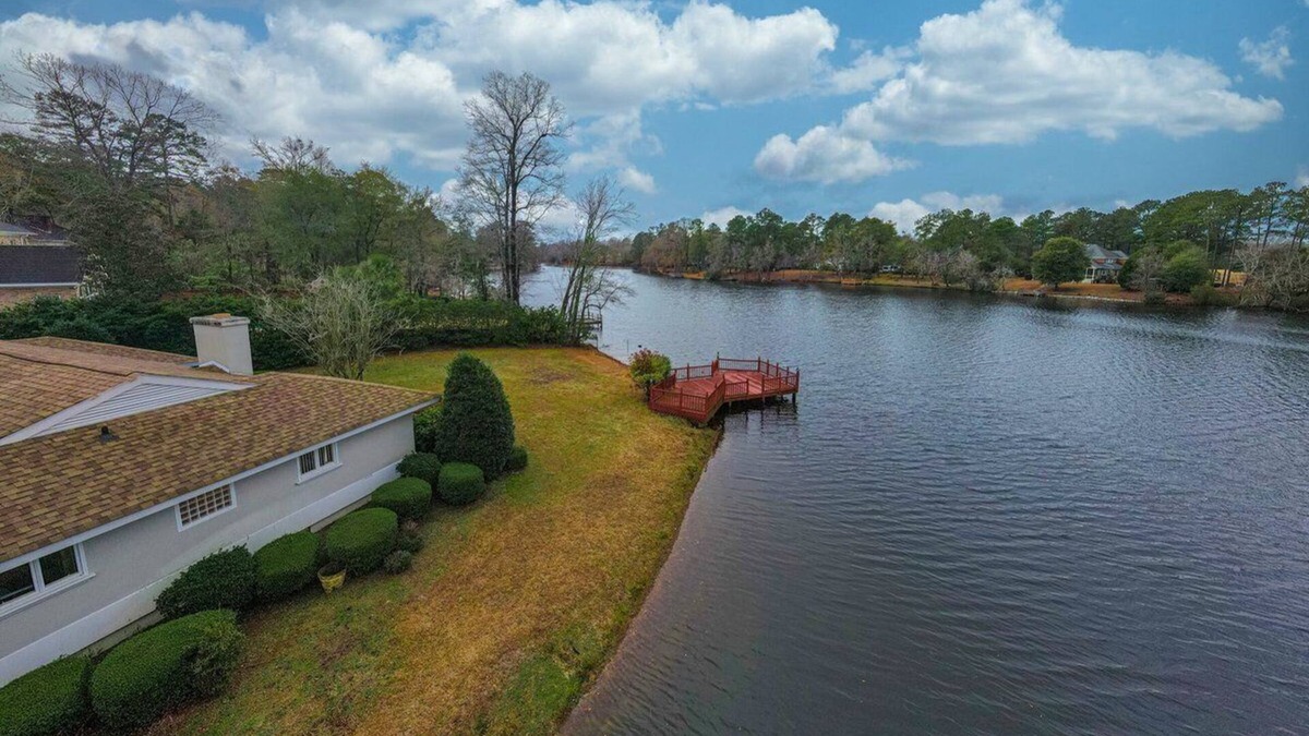 Florence House | Waterfront Paradise with Golf Course Views