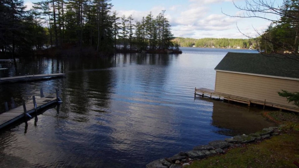 Sunapee House | Waterfront property on pond with private dock .