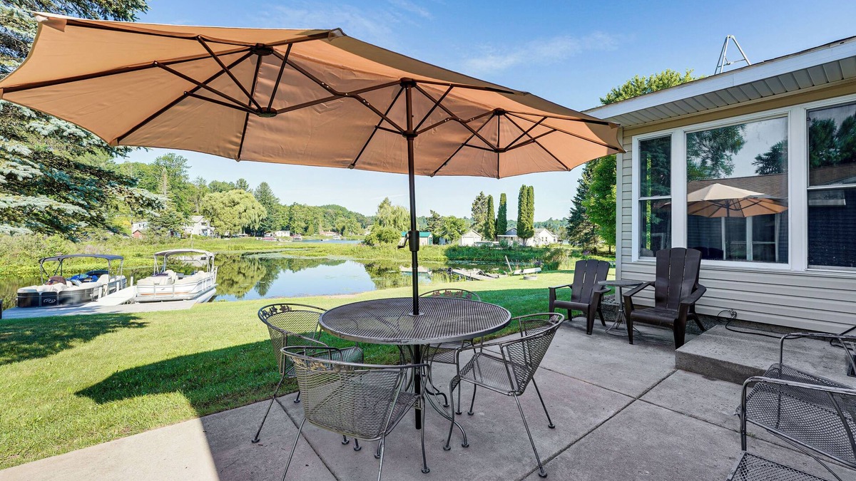 Reed City House | Waterfront Retreat w/Dock & Yard in Reed City!