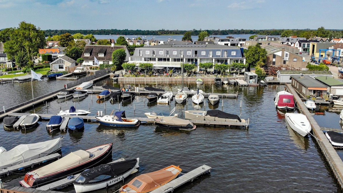 Oud-Loosdrecht Hotel | Waterfront Stay with Private Marina Access, Biking Trails and Lakeside Dining
