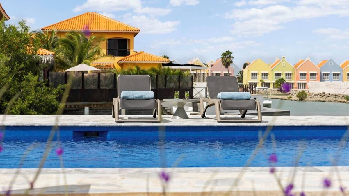 Tera Kora House | Waterfront villa with terrace, SUP boards, barbecue, and access to a shared swimming pool.