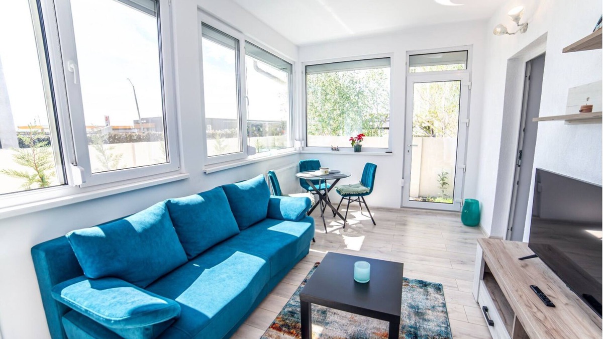 Tunari House | Welcome to GardenHideaway! Cozy stay with new furniture in a serene setting.