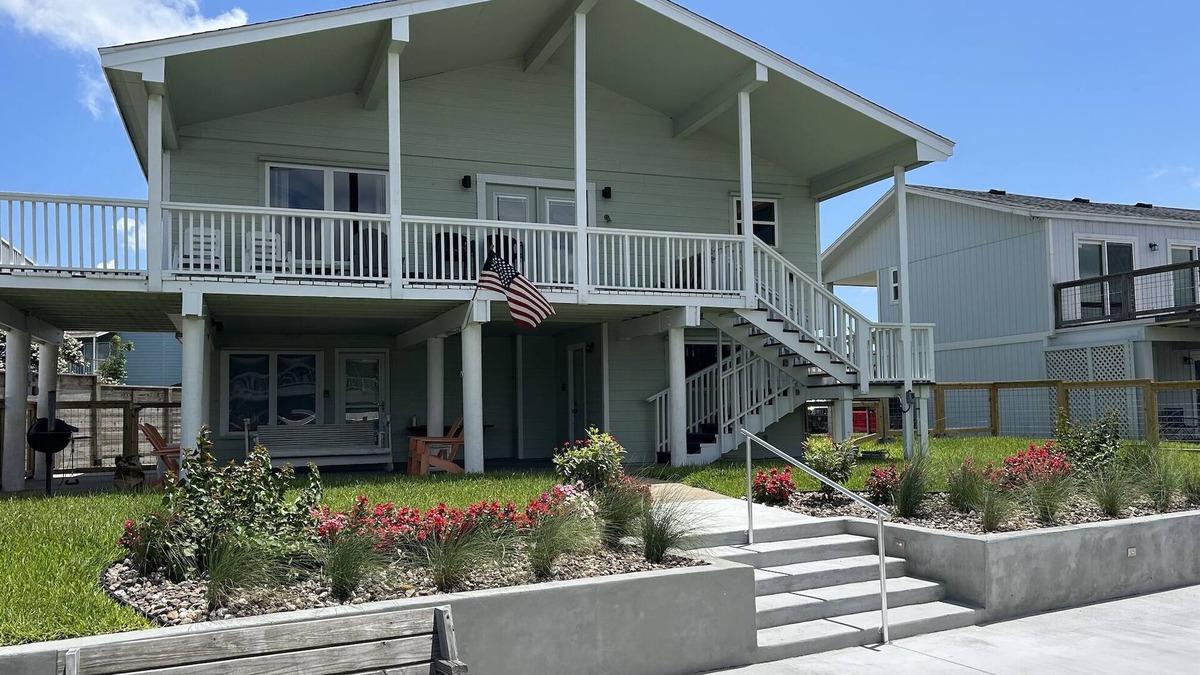 City-by-the Sea House | Welcome to The Lazy Bay | Canal Front Home with Boat Dock