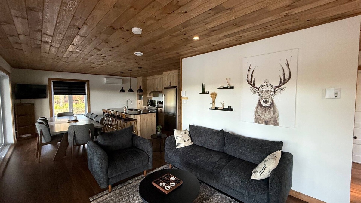 Riviere-Rouge Ski Chalet | Welcome to your haven of peace, a magnificent chalet nestled in the heart of nature.