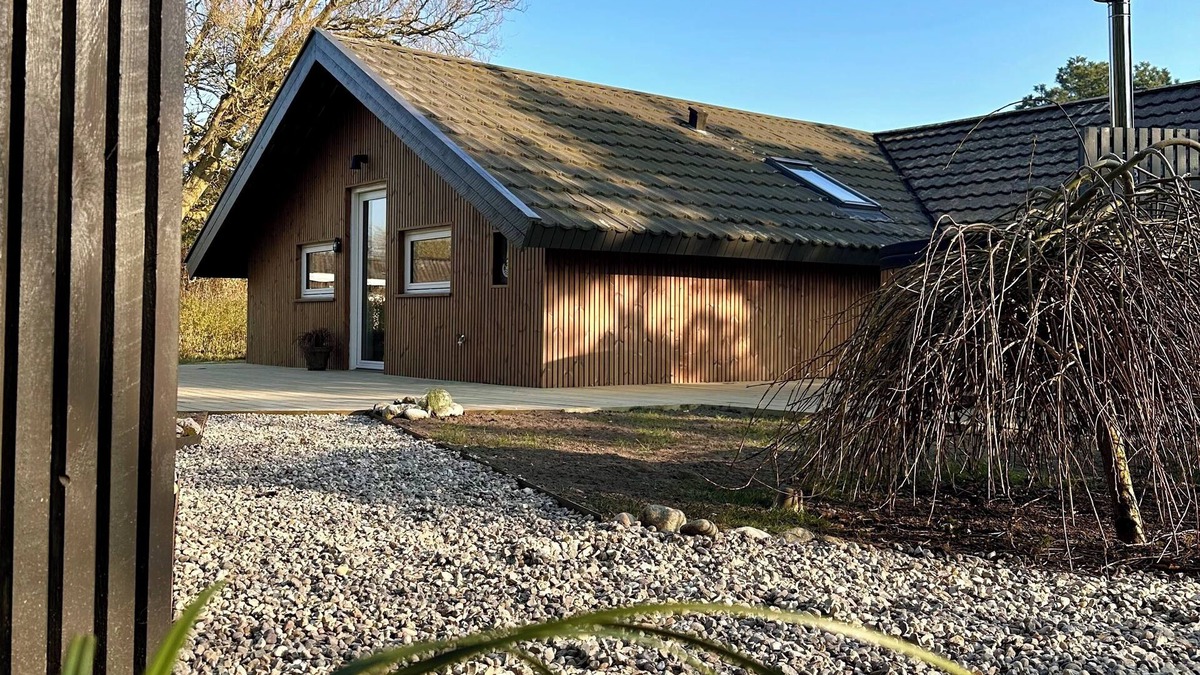 Skovmose Cottage | Welcome to your holiday retreat – relaxation and coziness await!