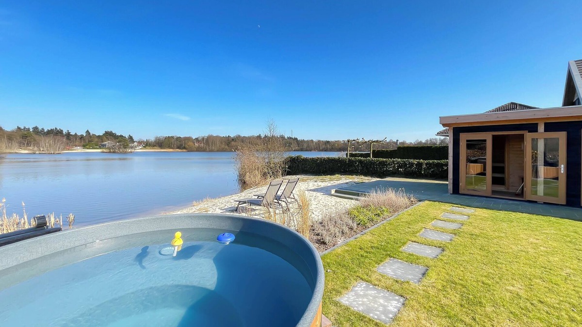 Westerhaar-Vriezenveensewijk House | Wellness house by the water with sauna, hot tub, and private beach