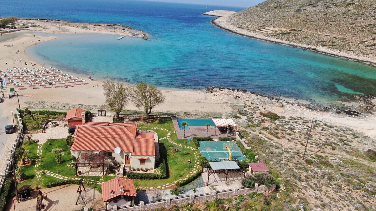 Stavros Villa | When the pool touches the sea.In front of the beach Antony Quinn danced syrtaki!