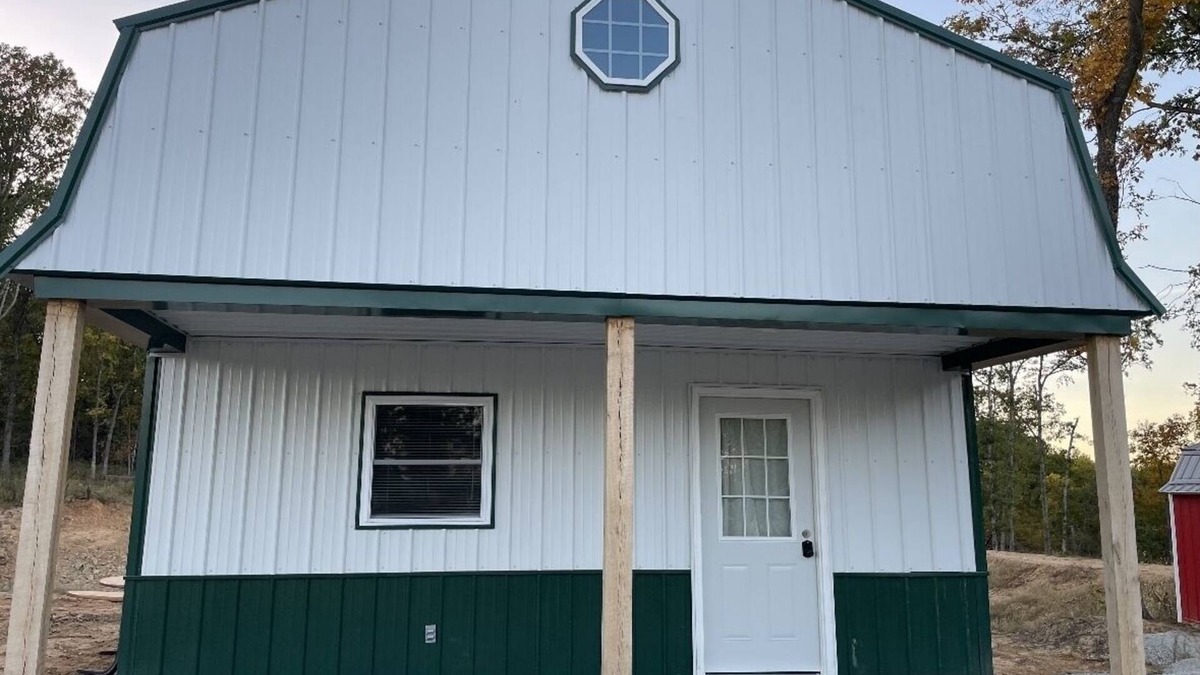 Johnson County Cabin | White cabin in the woods close to Univ. of Central Missouri and Whiteman AF Base