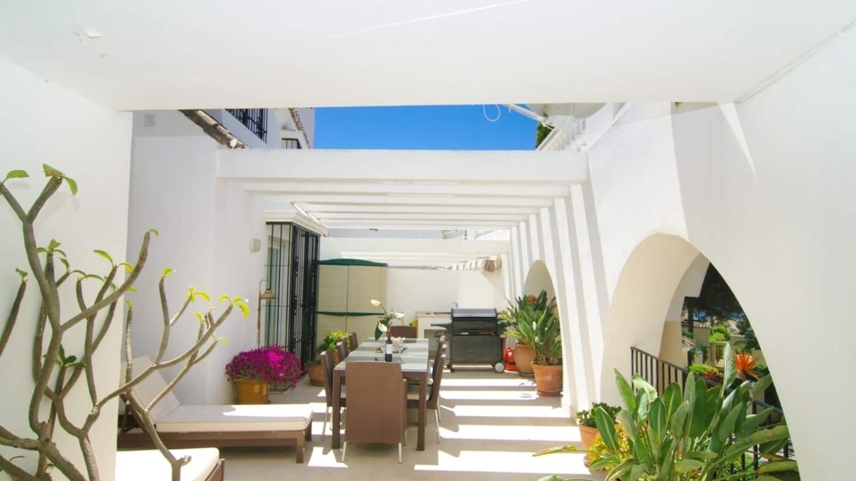 Nikki Beach Apartment | White Pearl Beach apartment with shared heated pool, BBQ