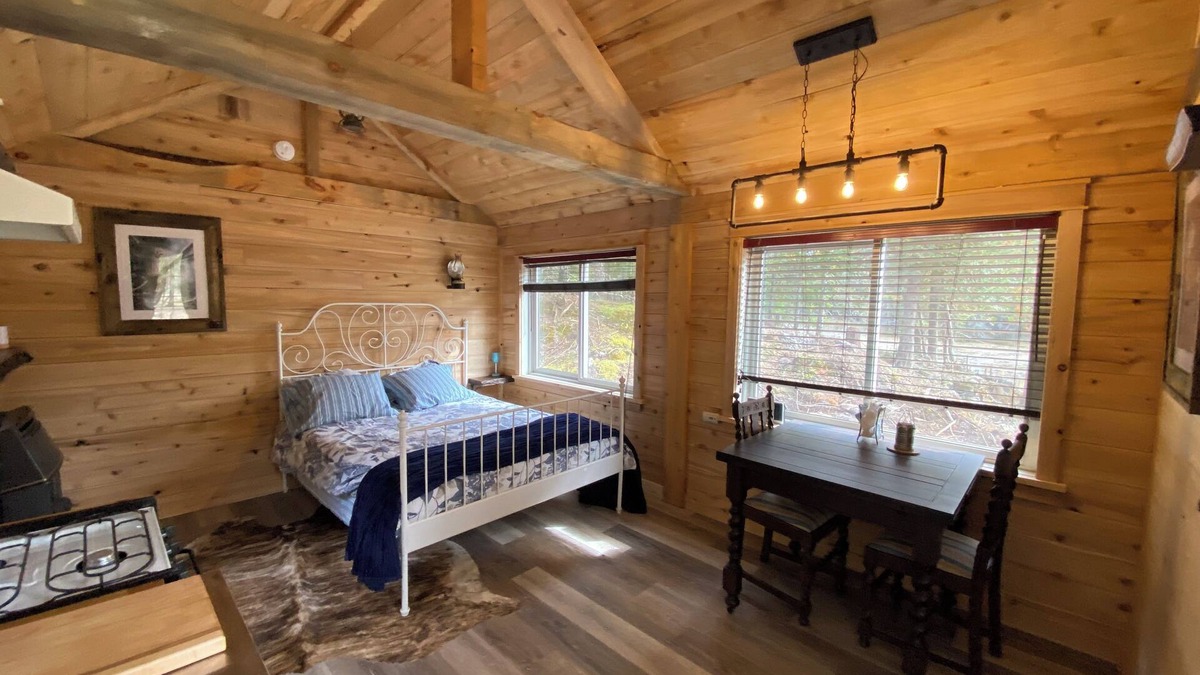 Lanark Cabin | White Pine Acres Cozy couples cabin in lanark private on a large pond & pines