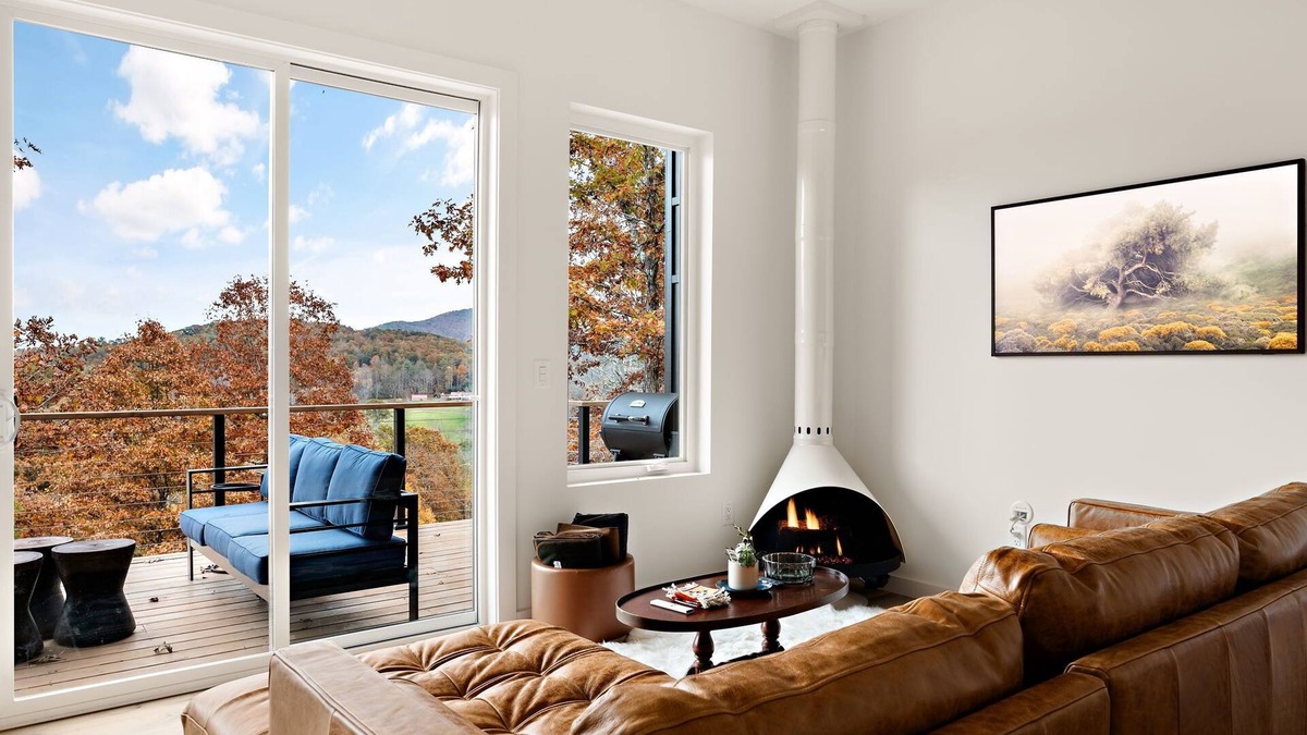 Young Harris Cabin | Wildcat Modern: Elegant mountain retreat with fire pit, deck, elevated furnishings, and pool and gym