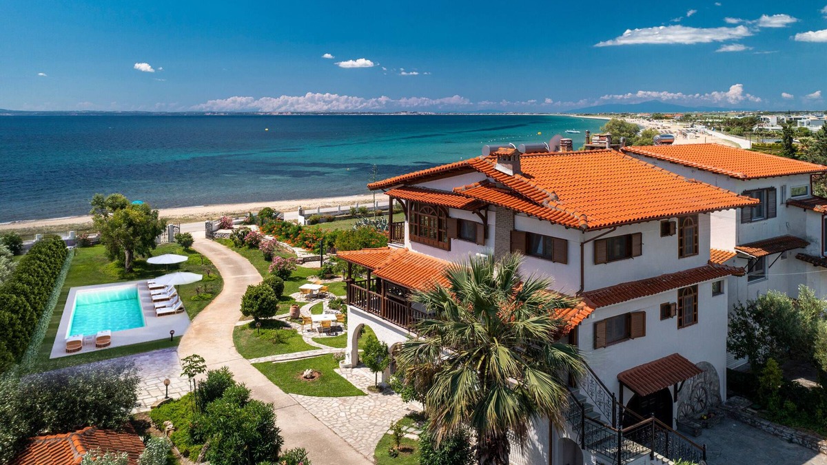 Kalivia Poliyirou Villa | Windmill Villa, a beachfront villa with private pool, for relaxing holidays