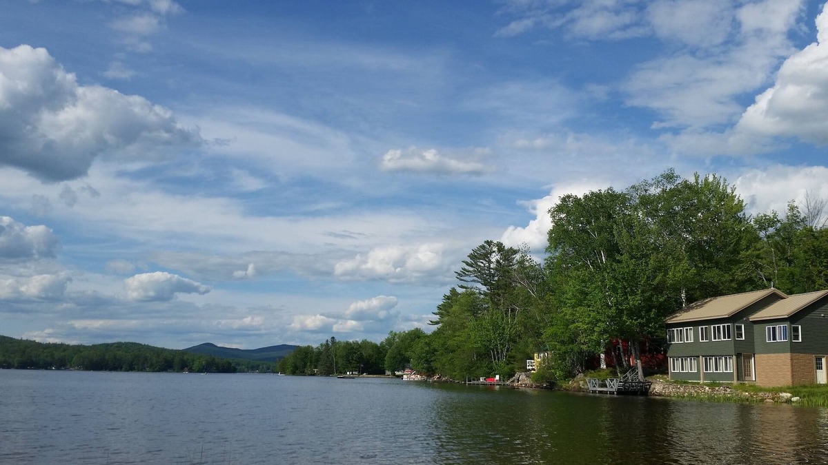 Peru House | Winter, Spring, Summer, or Fall this Worthley Pond Cottage has it all.