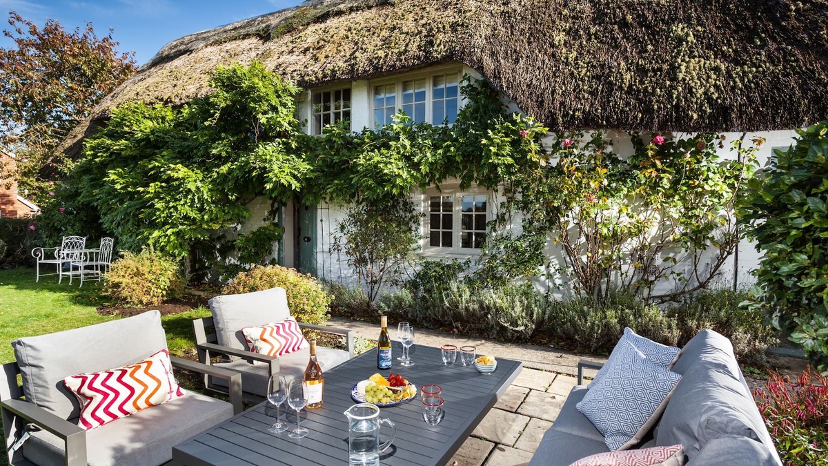 Urchfont Cottage | Wisteria Cottage is a late 18th century thatched cottage set in a small hamlet on the edge of a pict