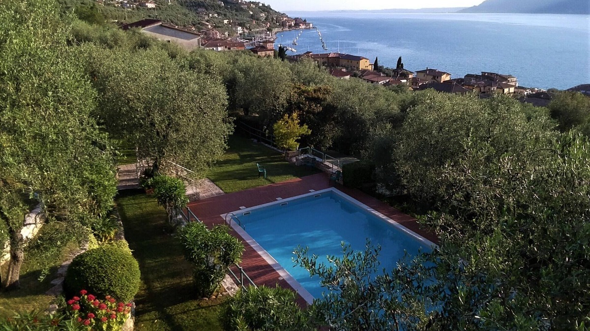 Assenza Apartment | Wonderful lake view with private garden and pool among olive trees