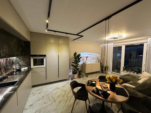 Nowy Port Apartment | Wood & Stone Apartment