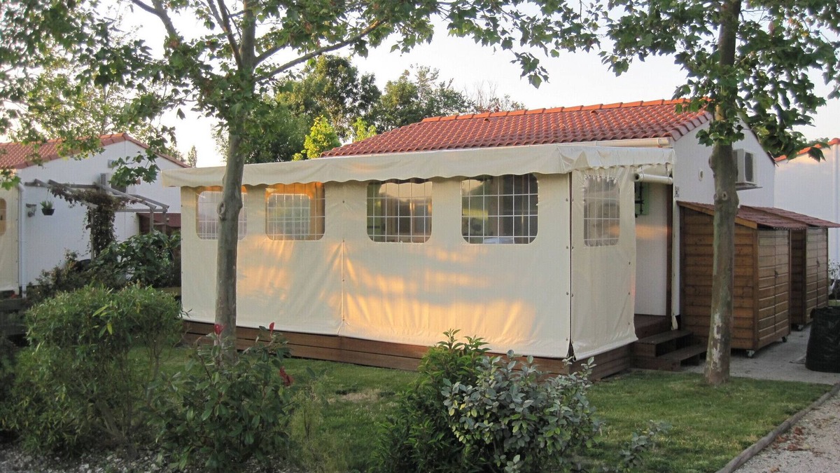 Saint-Pierre-d'Oleron Ski Chalet | wooden chalet in the gardens of St Pierre